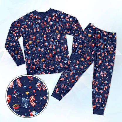Navy blue family matching holiday pajamas with hot dog and bow design