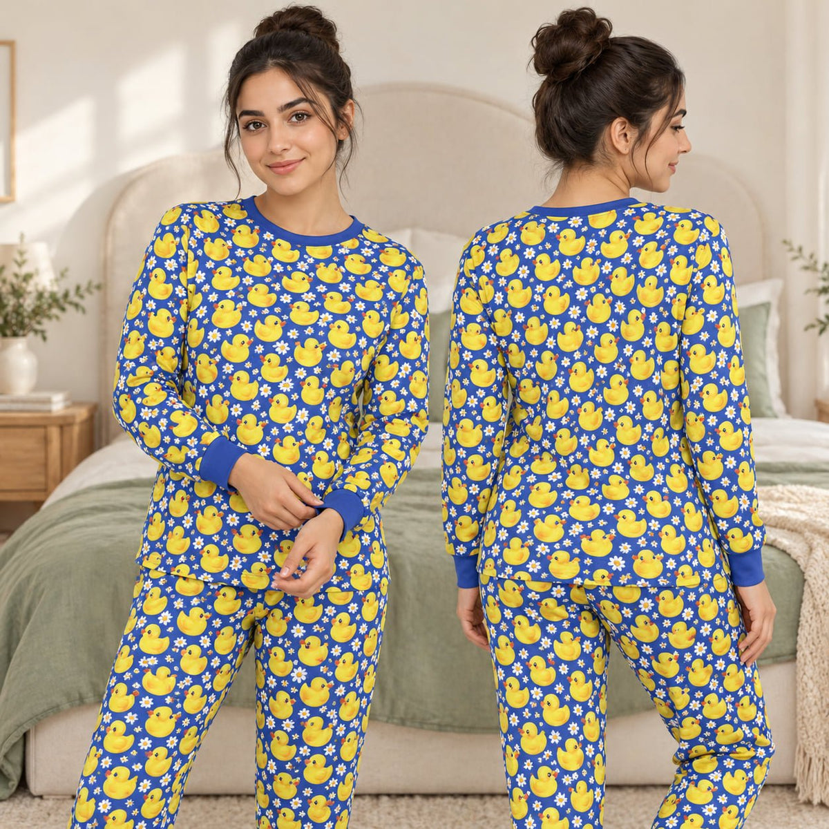 Animals pajama set featuring yellow rubber ducks and white daisies on a blue background, main view
