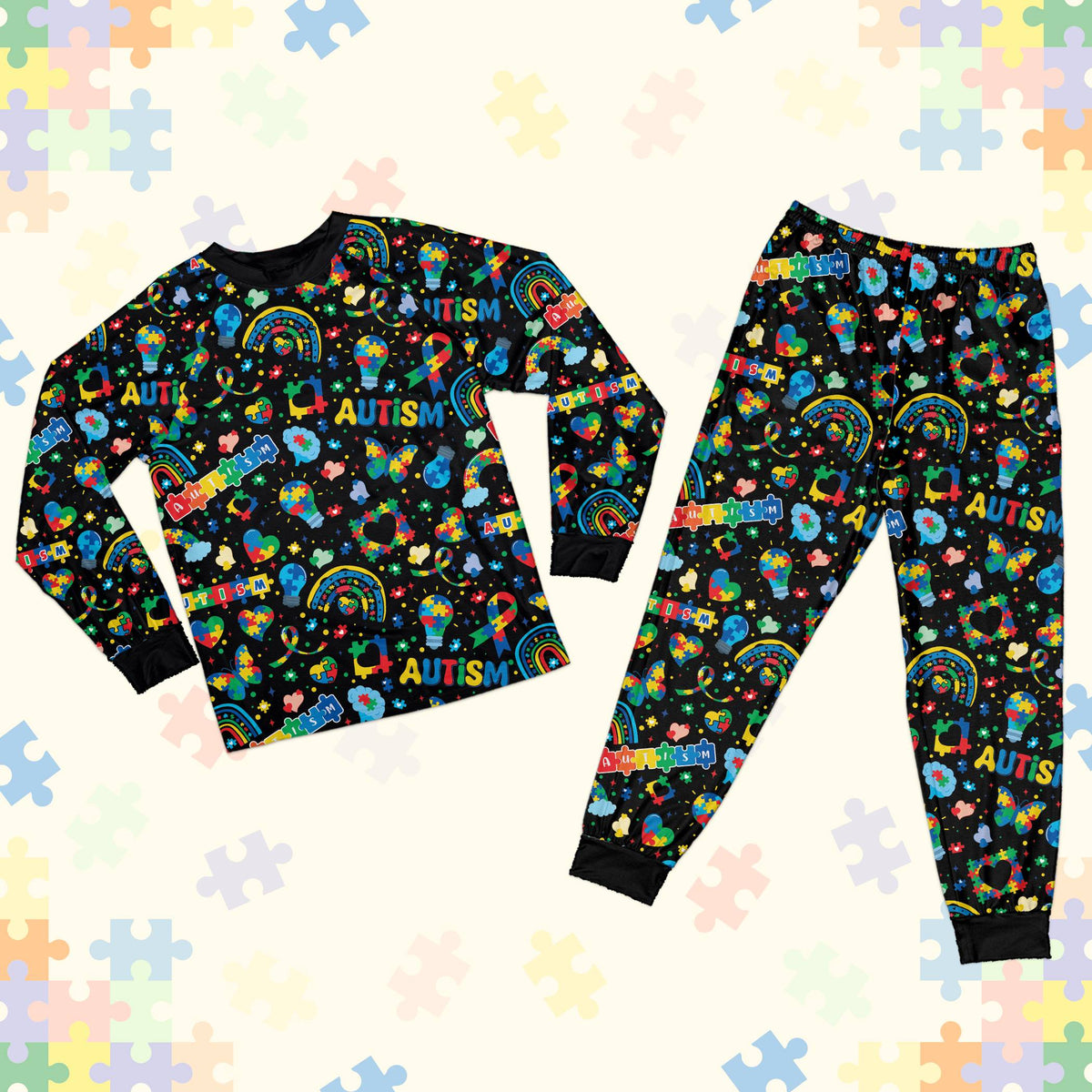 Black matching family pajamas featuring an autism awareness pajama set design with colorful puzzle pieces, main view