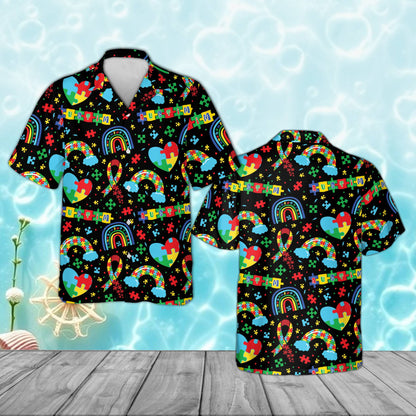 Black autism awareness pajama set with puzzle piece hearts and rainbows, front view