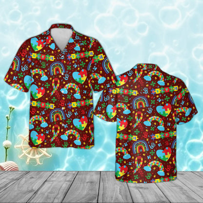 Red autism awareness pajama set with puzzle piece hearts and rainbows, front view