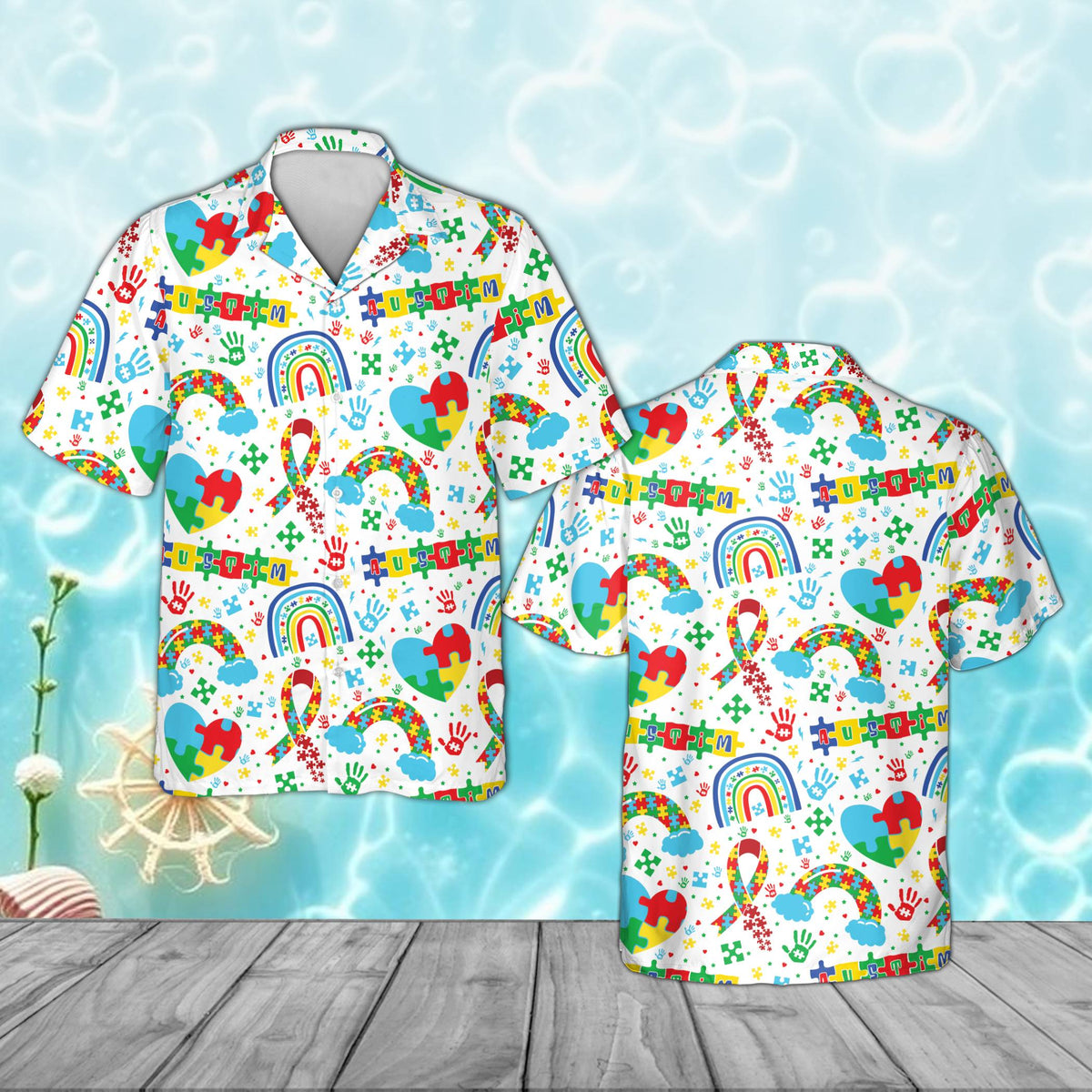 White autism awareness pajama set with puzzle piece hearts and rainbows, front view