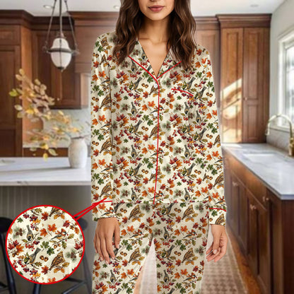 Sleepwear featuring autumn birds and red piping, front view