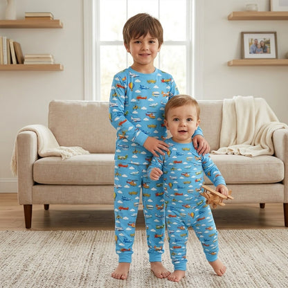 Close up of the light blue aviation pajama set worn in a cozy lifestyle setting