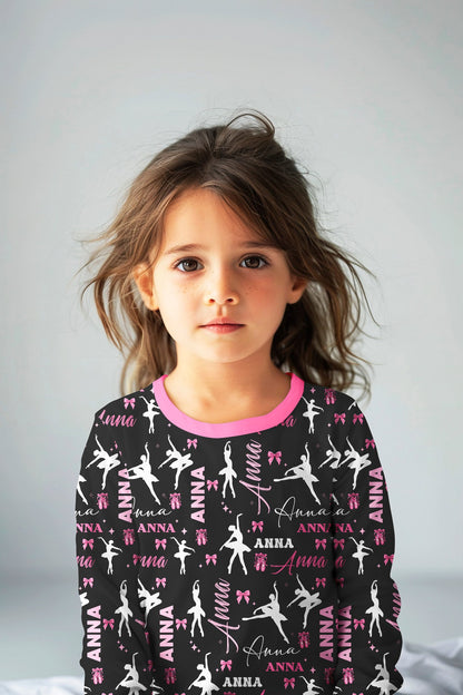 Lifestyle view of a child wearing the personalized ballet pajama set