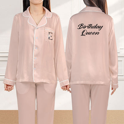 Pink birthday pajama set featuring custom text, front view