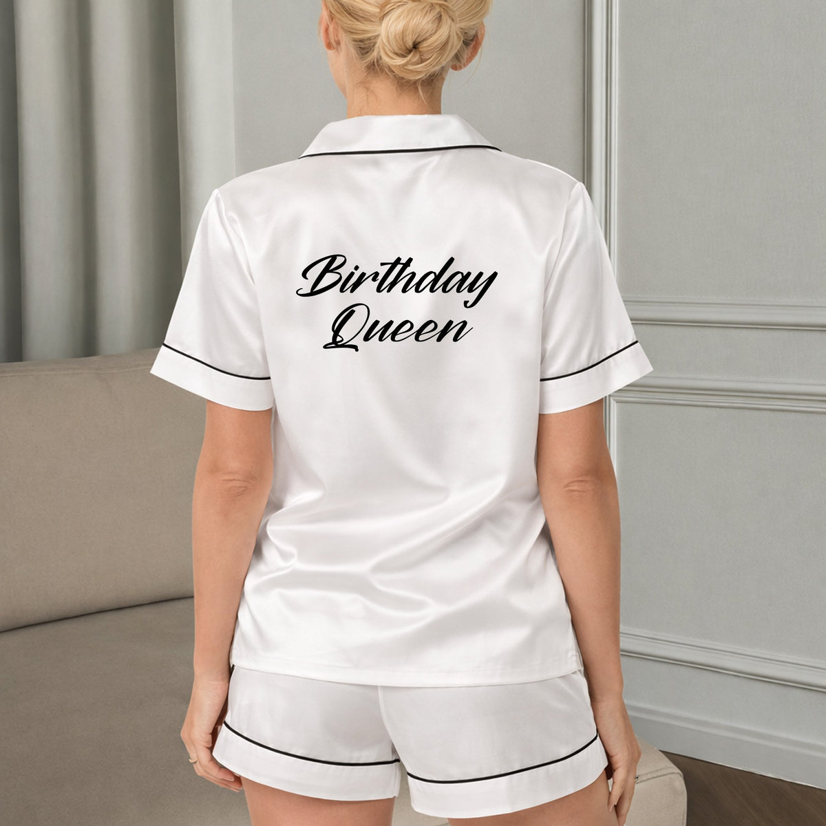 Back view of the white custom text pajama set showing birthday design