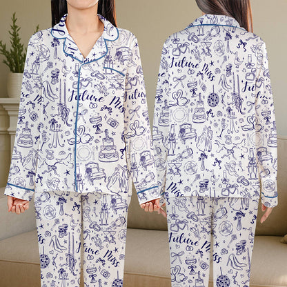 White pajama set with blue rings and cakes pattern, front view