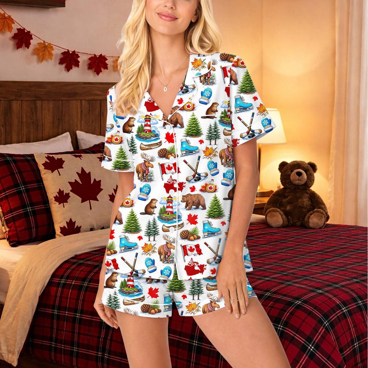 Front view of the matching family pajamas set in white with colorful icons