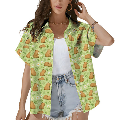 Third lifestyle view showing the floral capybara pattern on matching pajamas