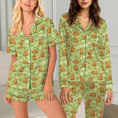 Sixth lifestyle view of the capybara and daisy patterned pajamas