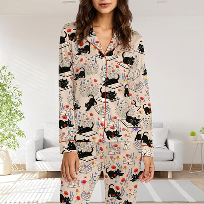 Close-up front view of cats and books pajama design
