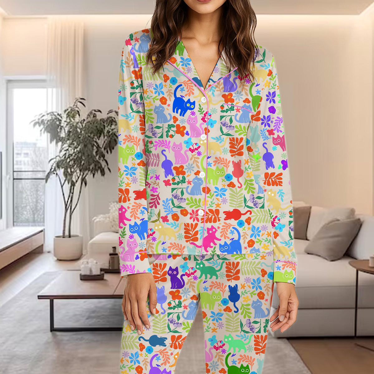 Final lifestyle view of the vibrant cats and botanical pajama set.