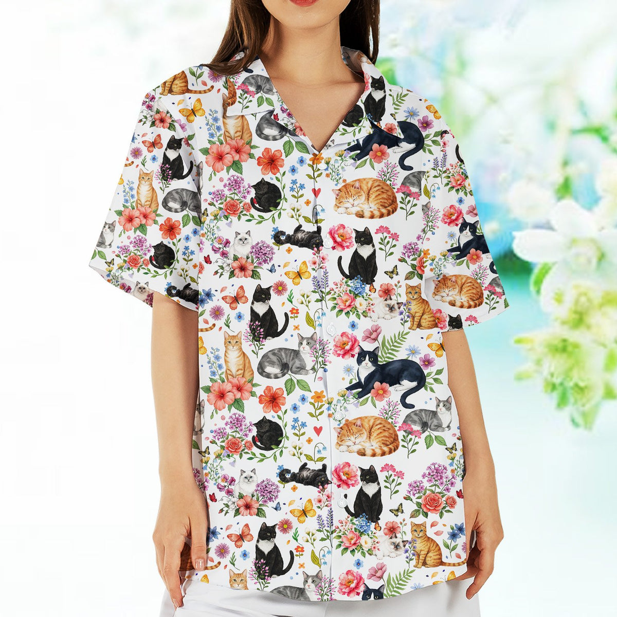Lifestyle view of a person relaxing in the cats and flowers pajama set