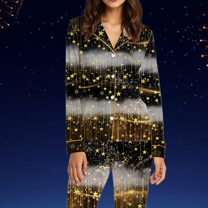 Front view of black and gold celestial pajama set
