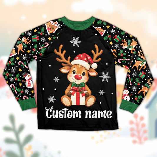 Matching family christmas pajama set featuring a cute reindeer with Santa hat and custom name, displayed against a clean background.