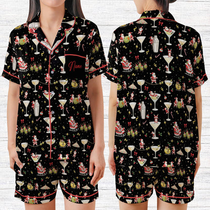 Black festive holiday matching family pajamas with whimsical Santa print