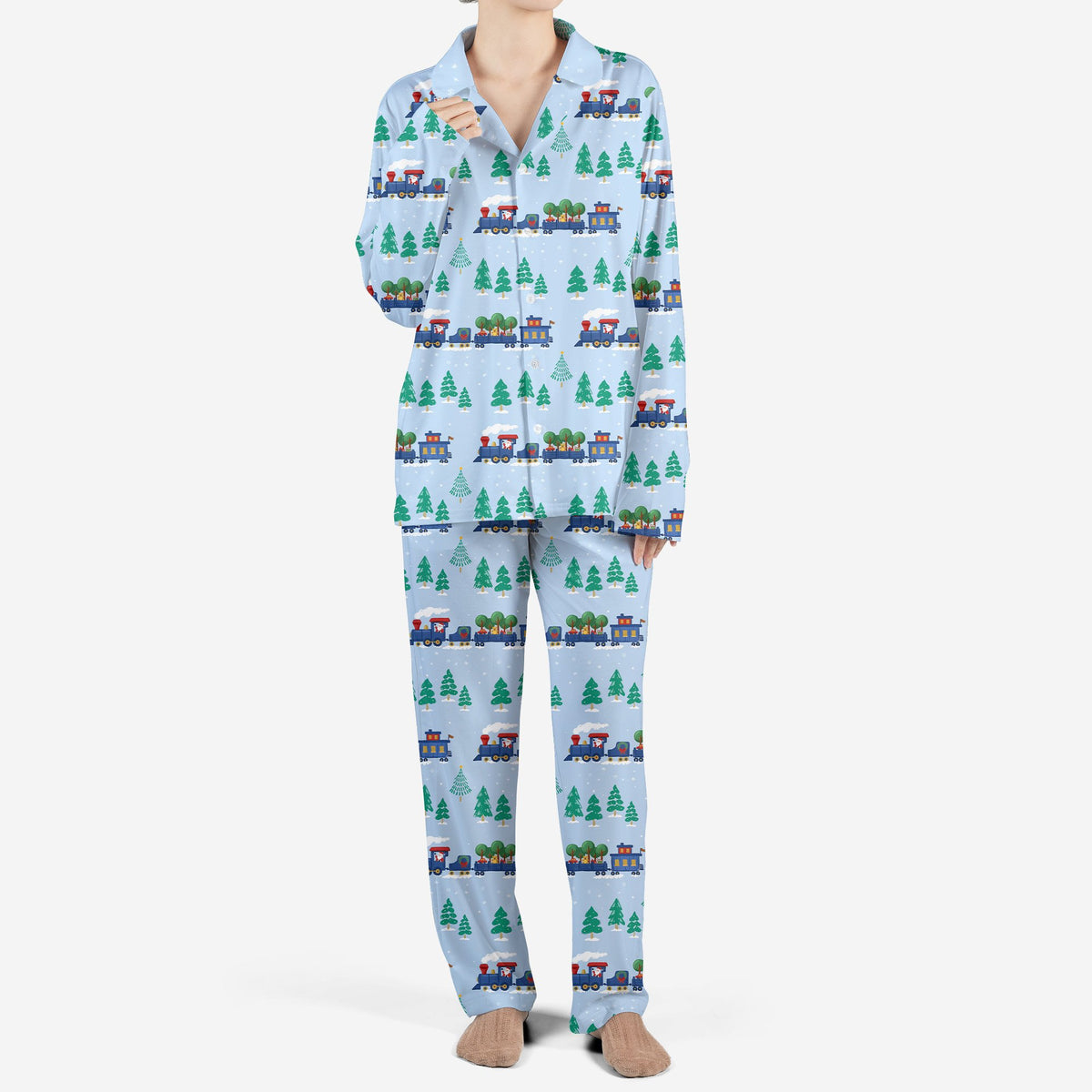 Detailed front view of the holiday toy train pajama set