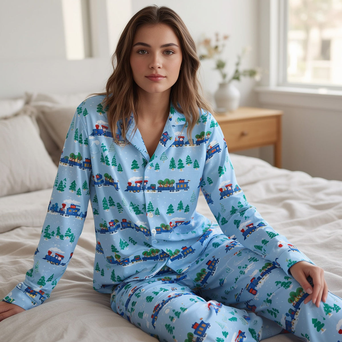 Another lifestyle view of family in matching holiday pajamas