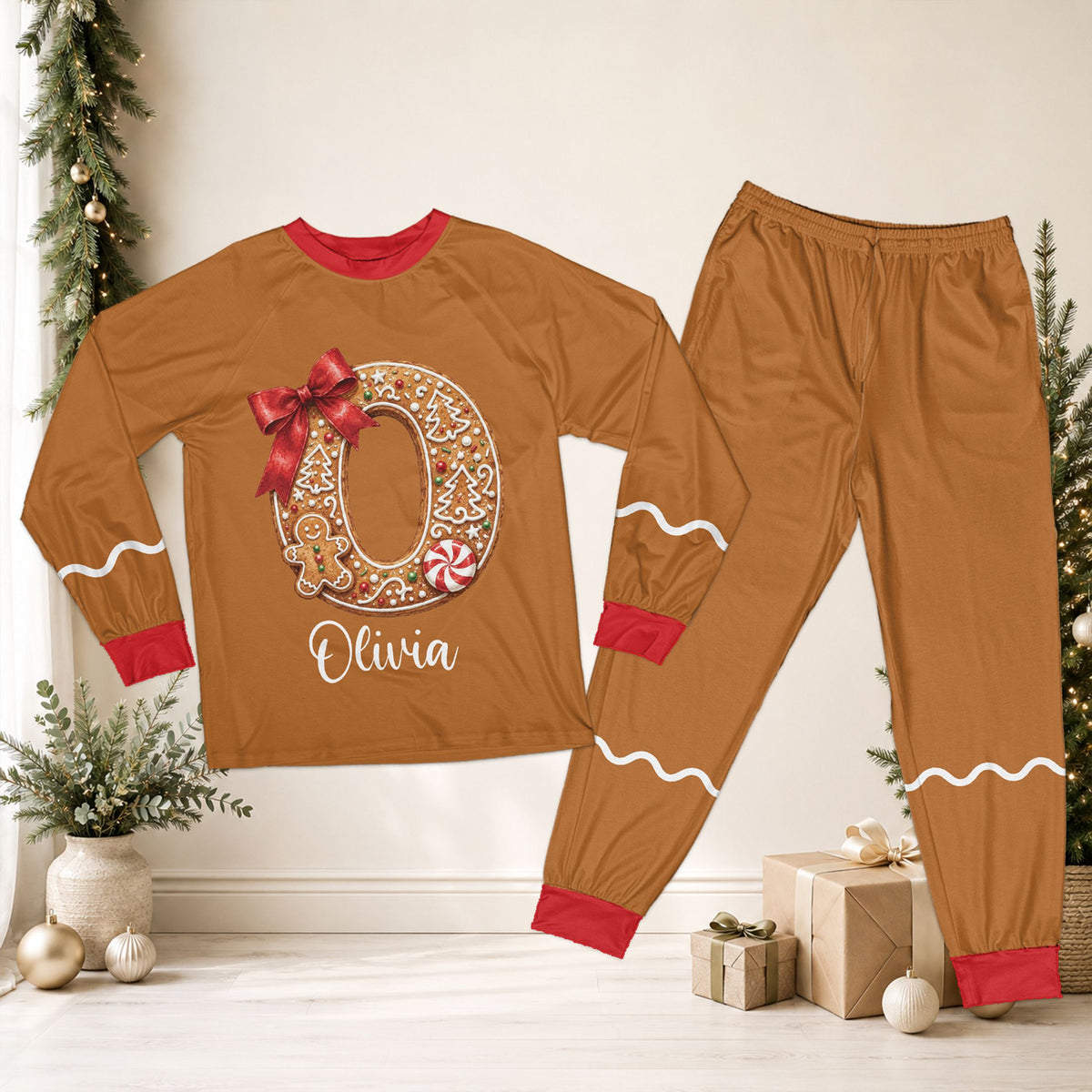 Detailed front view of the matching family xmas pajamas with gingerbread letter and red accents