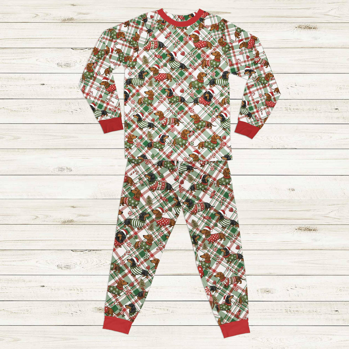 Matching family plaid pajamas featuring festive Christmas dachshunds, front view