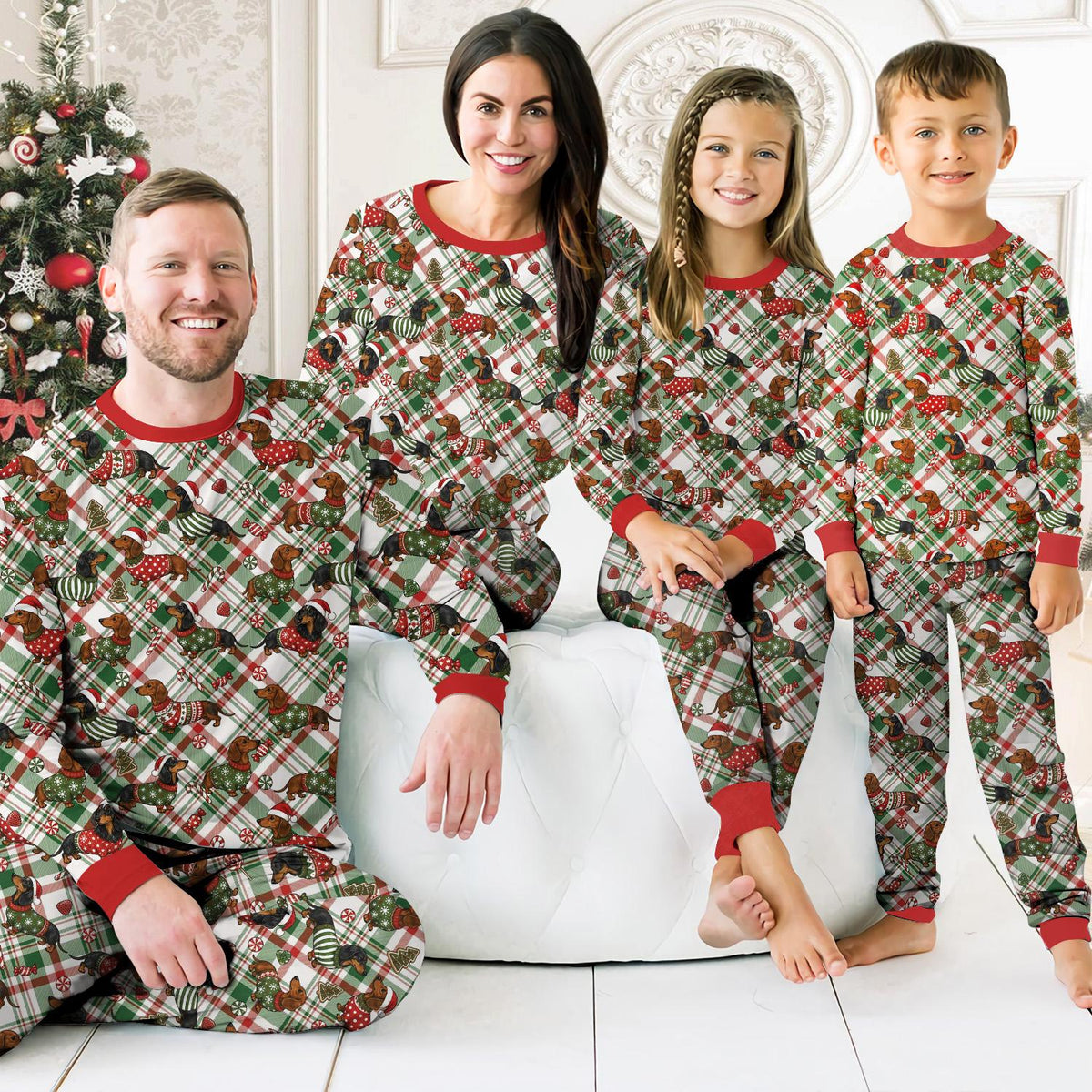 Family wearing matching xmas pajamas family sets in a lifestyle setting