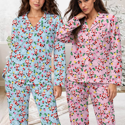 Front view showcasing the intricate Santa Claus and colorful lights print on the pajama set