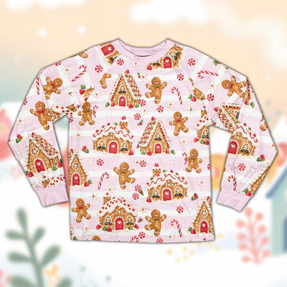 Front view of matching family holiday pajamas with gingerbread print