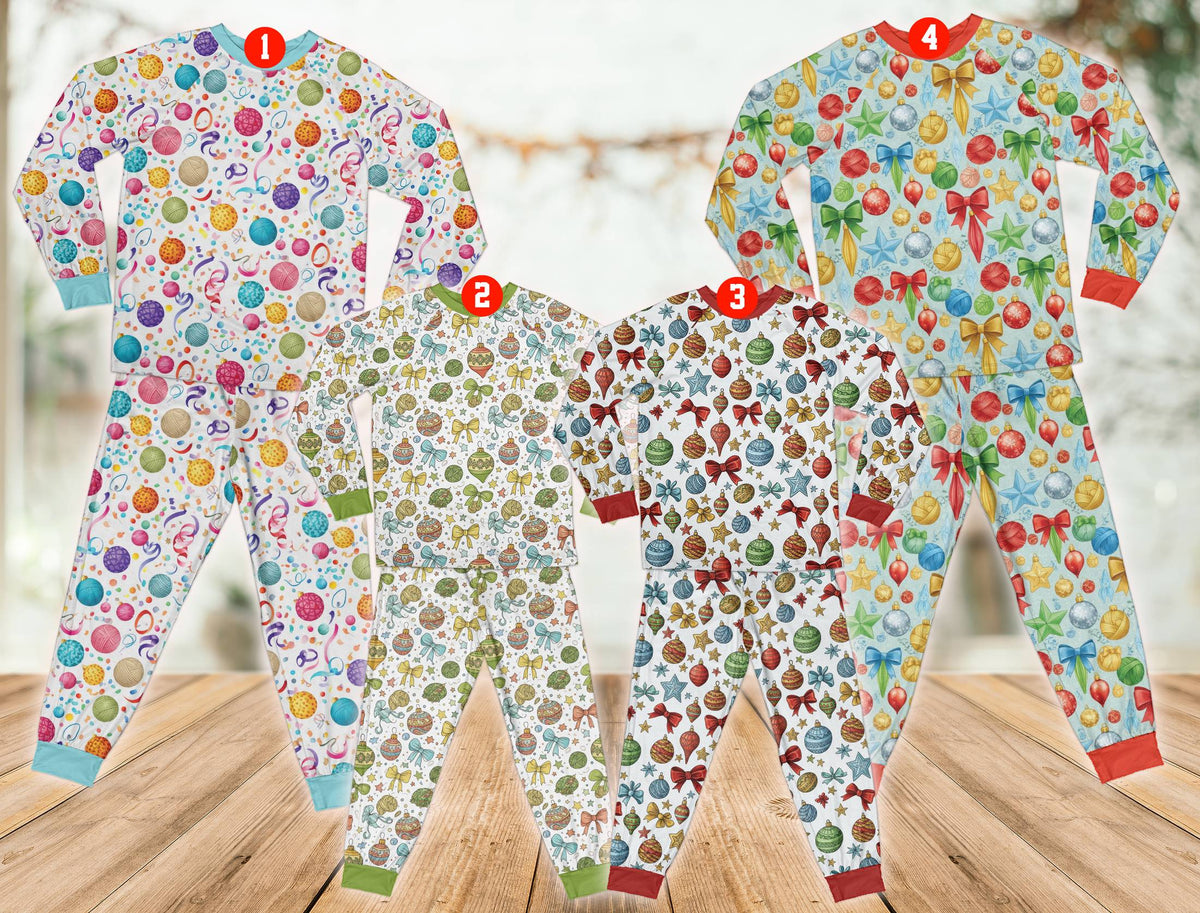 Main front view of the christmas pajama set featuring festive ornaments and bows