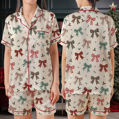 Lifestyle view of matching xmas pajamas family gathered for the holidays