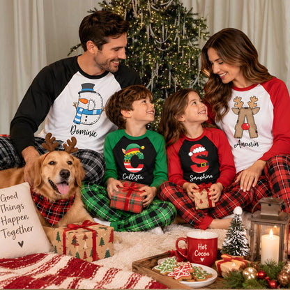 Family wearing matching christmas pajama set together in a festive lifestyle setting