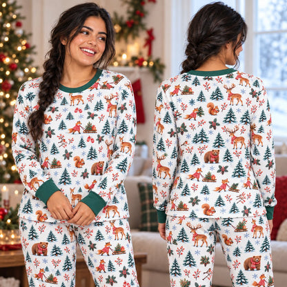 Family enjoying the holidays wearing their matching xmas family pajamas