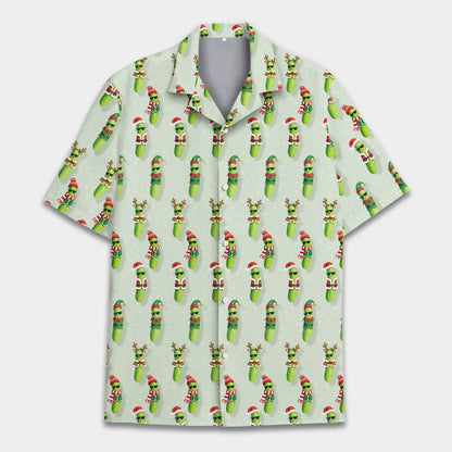 Another lifestyle view of family matching holiday pajamas with the festive pickle design