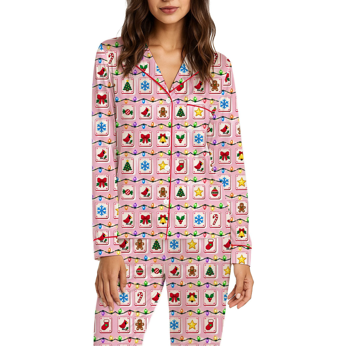 Front view of the pink Christmas pajama set top showing festive icons