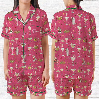 Pink matching xmas family pajamas featuring playful Santa design
