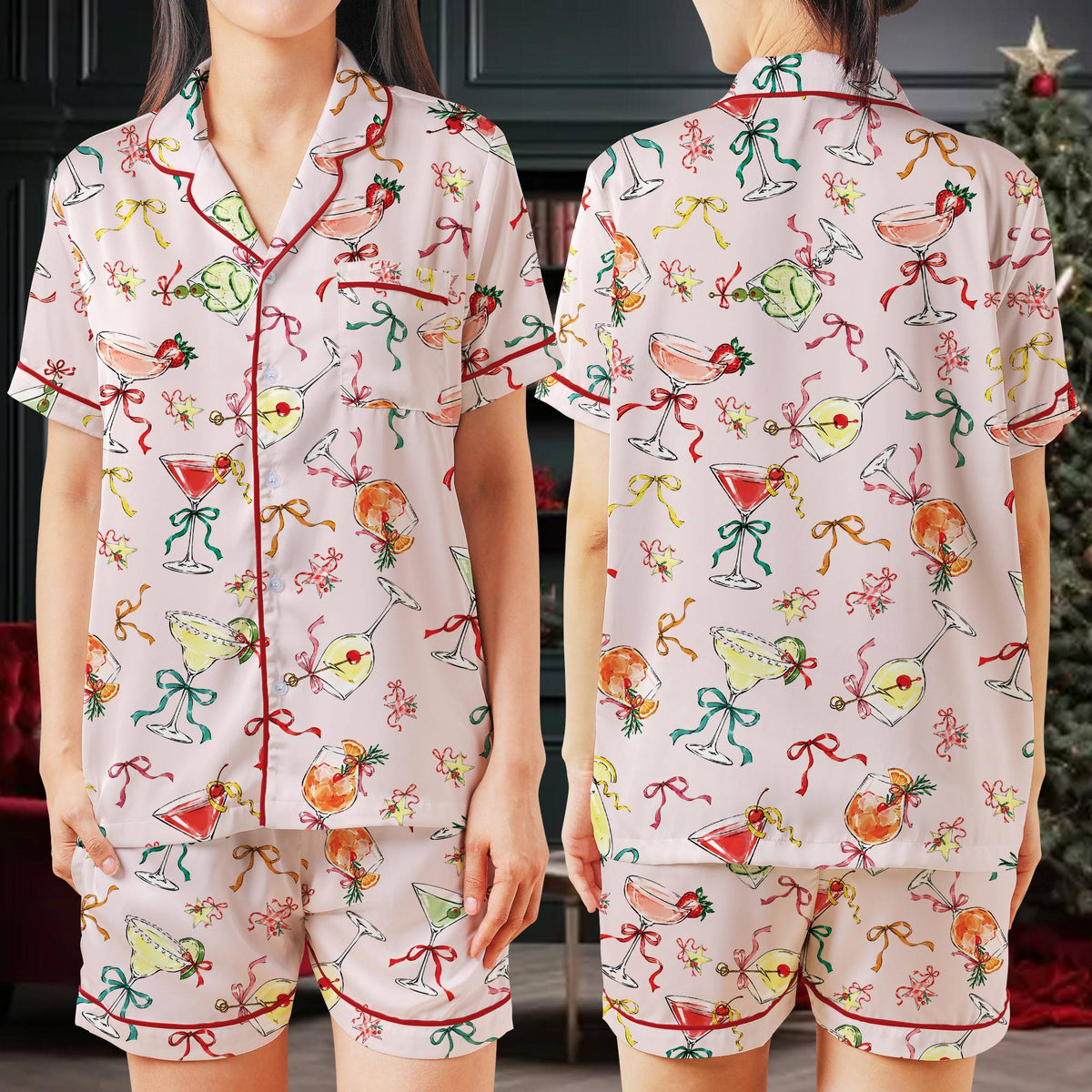Front view showing the hand-drawn fruit and ribbon cocktail design on the pajama set