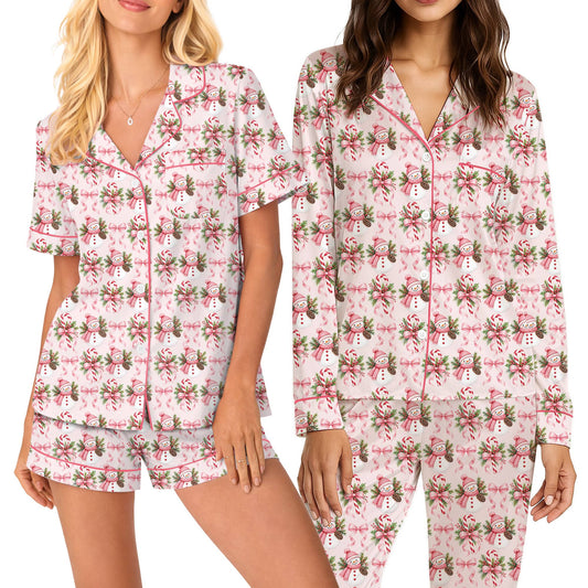 Main view of the light pink christmas pajama set featuring snowmen and candy canes