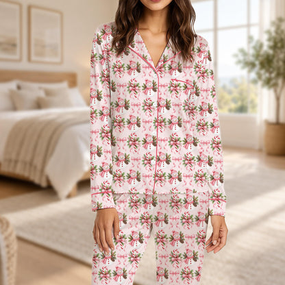 Close-up lifestyle view of the festive snowman print on the pajamas