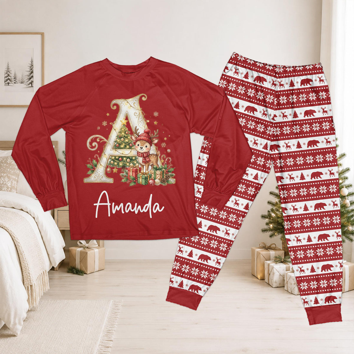 Front view of a personalized red christmas pajama set featuring a custom name, reindeer, and holiday striped pants