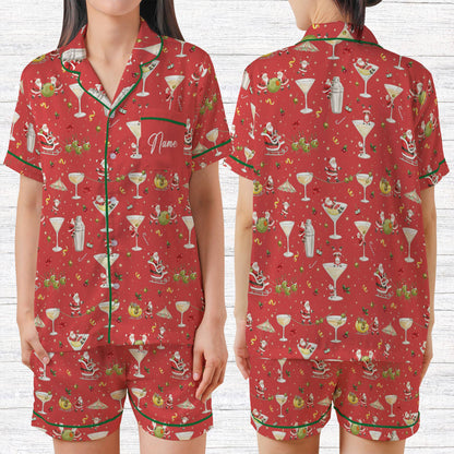 Red family matching holiday pajamas with martini Santa poses