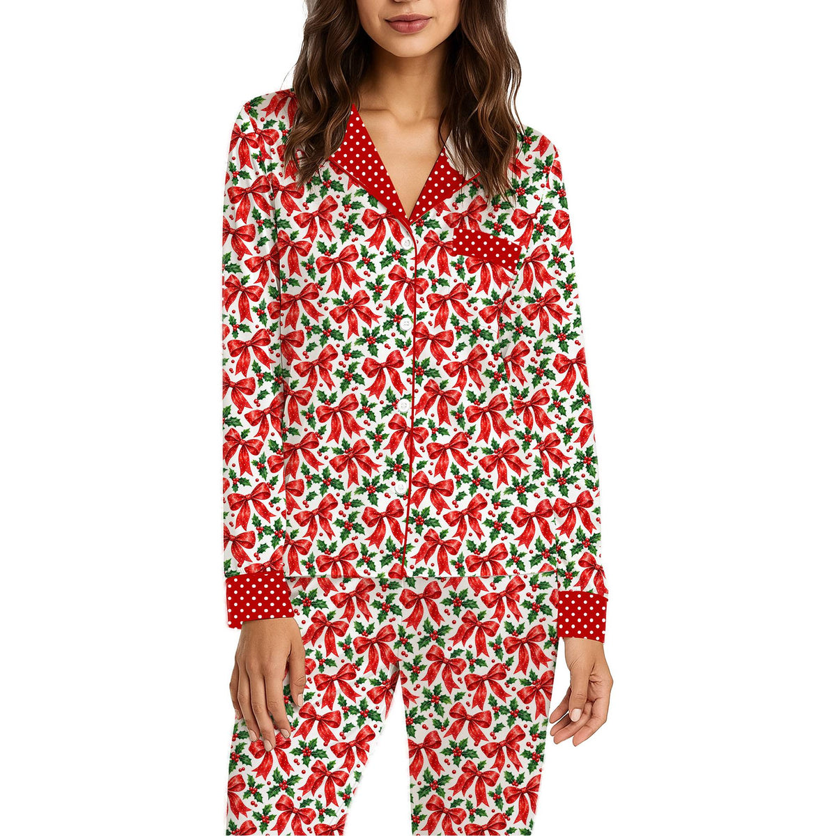Christmas pajama set with red bows and green holly on a white background, front view
