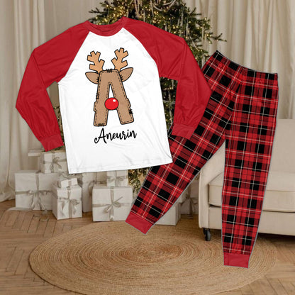 White long-sleeve top and plaid pants matching family christmas pajama set with custom initial
