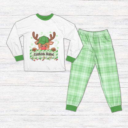 Matching family christmas pajama set with reindeer design and white shirt, front view