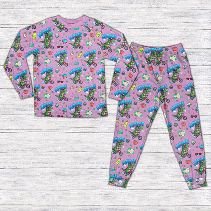 Dinosaur bike pajama set in purple for matching family, front view
