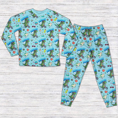 Dinosaur bike pajama set in teal for matching family, front view