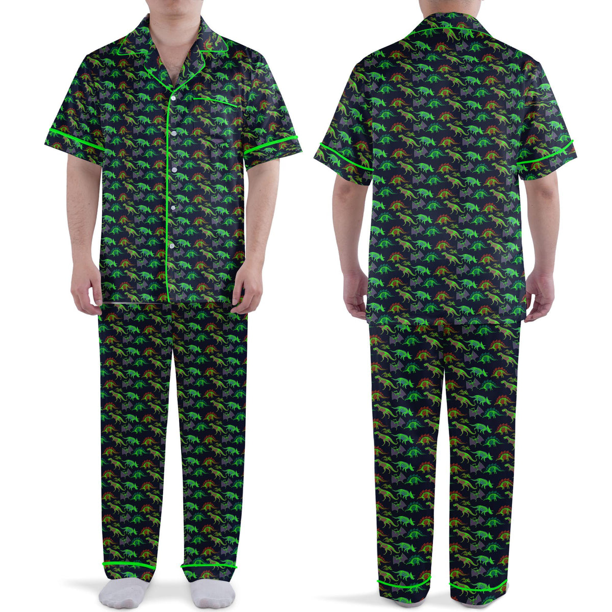 Front view of the dinosaur pajama set featuring colorful neon skeletons on a dark background with green piping