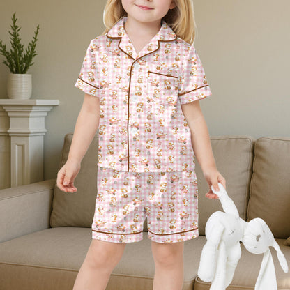 Close up front view of the pajama top with farm duck illustrations