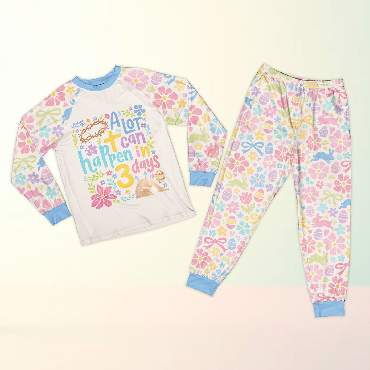 Close-up front view of the white easter pajama set top displaying the cross and empty tomb design