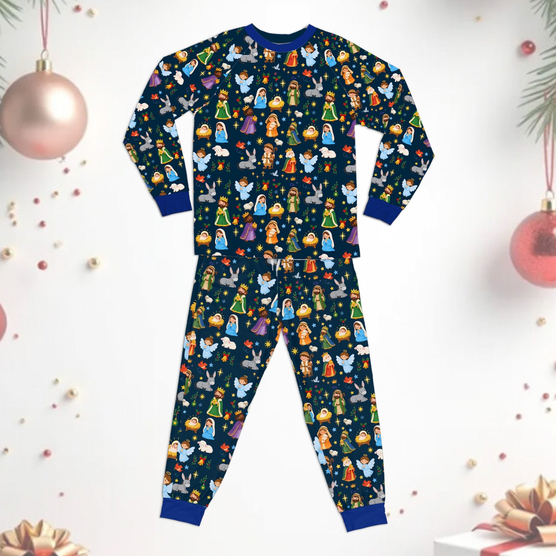 Close-up lifestyle view of the family pajama set holiday with multicolor nativity design