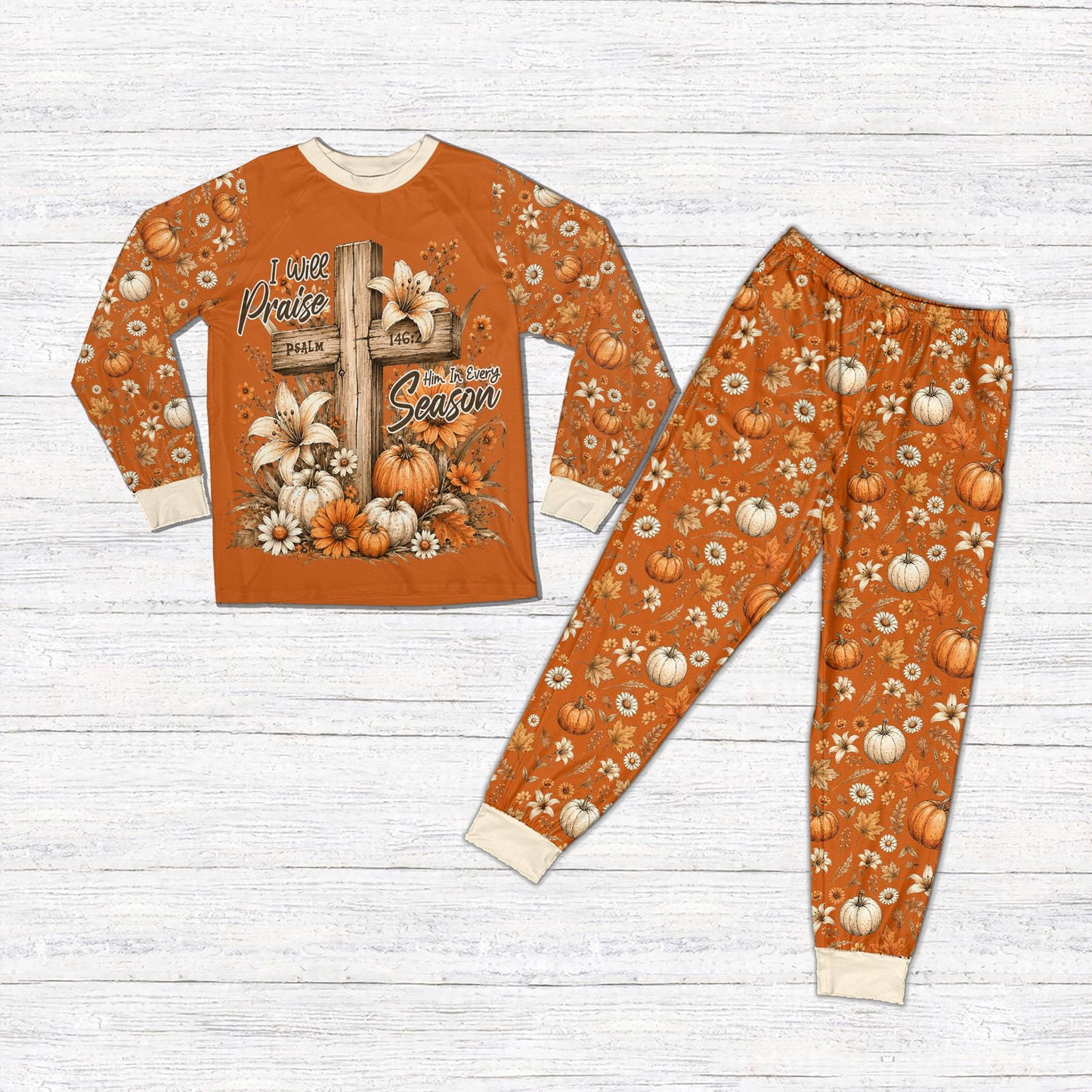 Matching pajamas for family featuring wooden cross and pumpkin design